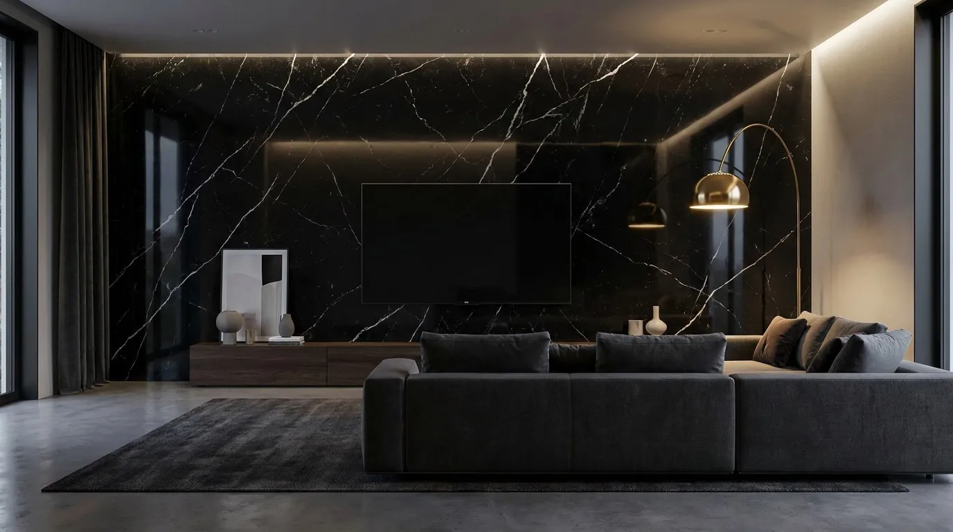 Bold black Nero Marquina UV marble accent wall behind a TV